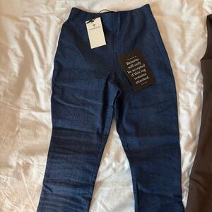 Tags on new denim pencil pants